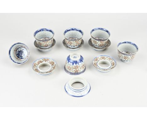 Six 19th century Chinese porcelain cups with coasters. Floral/bat/gold decor. Four character bottom mark. One bottom ring dam