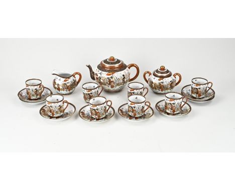 Antique Japanese eggshell porcelain tea set. With geisha in garden/gold decor. Circa 1920. Consisting of; eight cups + saucer