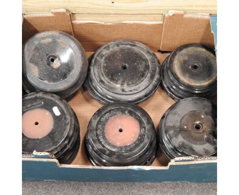 A collection of oil lamp bases, largest 20cm