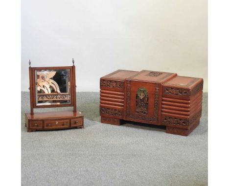 An early 20th century Eastern hardwood trunk, together with a Victorian swing frame toiletry mirror (2)trunk 73w x 35d x 39h 