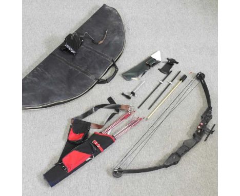 A Compound bow and arrow set, in a soft caseOverall appears to be complete, but shows signs of use. We have not fired it.