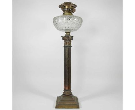 A brass Corinthian column oil lamp base, with a cut glass font, 65cm highOverall very dirty and the metal is tarnshed. The gl