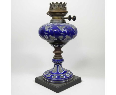 A Bohemian overlaid blue glass oil lamp base, 32cm high