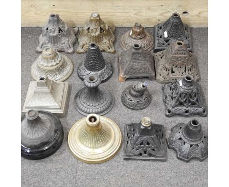 A collection of cast iron oil lamp bases