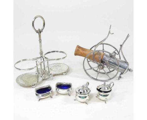 A pair of silver mustards, together with a silver plated novelty table carriage in the form of a cannon, a plated bottle hold