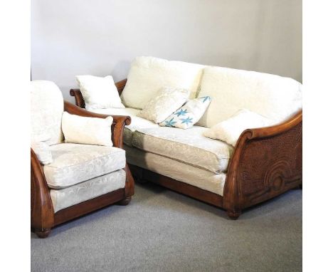 A Multiyork hardwood double cane bergere sofa, with cream cushions together with a matching armchairsofa 213w x 100d x 74h cm