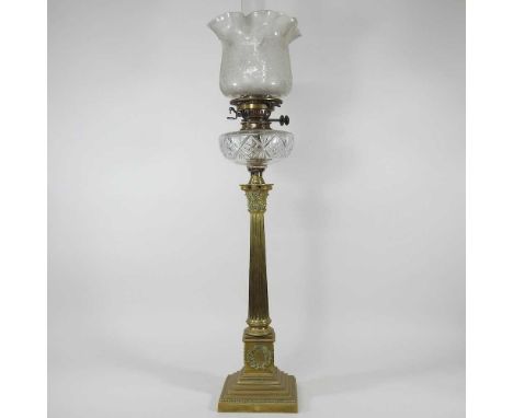 A brass column oil lamp, with a cut glass reservoir and etched glass shade, 81cm highOverall dirty and dull. The glass font a