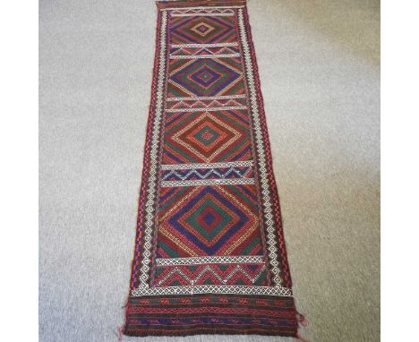 A large runner, with geometric design, 271 x 71cm