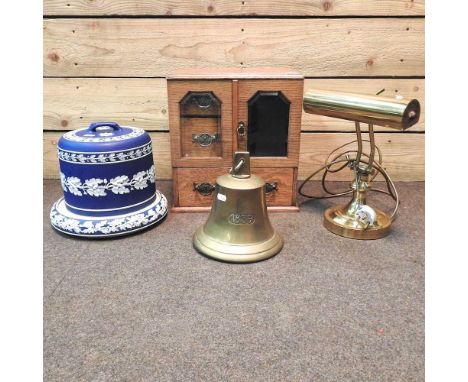 An Edwardian light oak smoker's cabinet, 32cm wide, together with a brass school bell, dated 1839, 21cm high, a jasperware ch