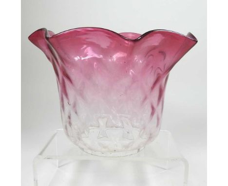 A pink glass oil lamp shade, with a frilled edge, 15cm high