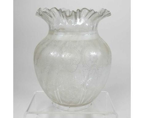 A clear etched glass oil lamp shade, with a frilled edge, 21cm highDirty with very light surface marks. Air bubbles within th