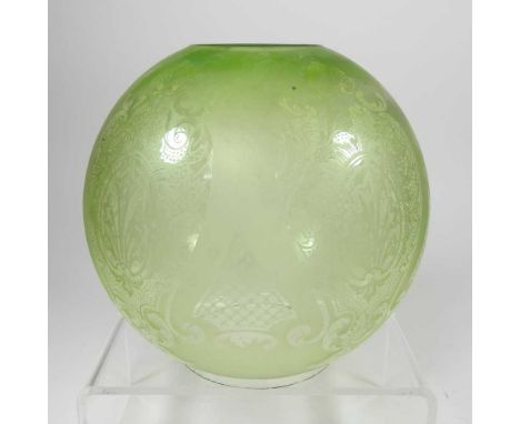 A green etched glass oil lamp shade, 18cm highDirty with light surface marks. Various small chips around the base.