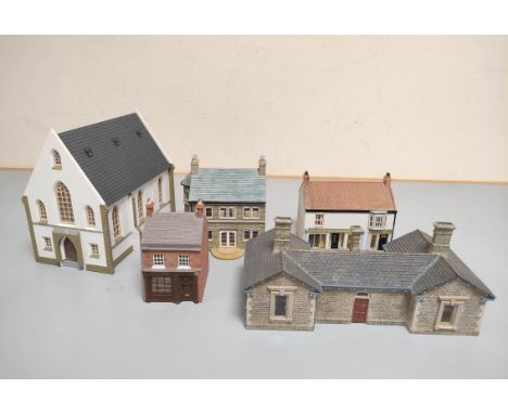Box containing five model railway buildings including a Faller Church, Hornby outfitters shop, Bachmann townhouse, etc.&nbsp;
