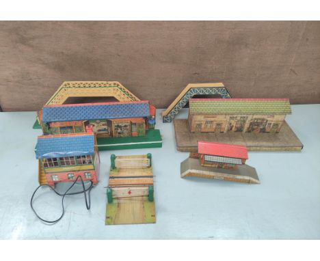 Box containing a collection of die cast model railway buildings to include a Hornby Railway Crossing, Hornby Meccano Bridge e