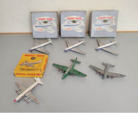 Dinky toys - Four boxed model aeroplanes comprising of three Dinky D H Comet Airliners No 999 and a Vickers Viscount 800 Airl