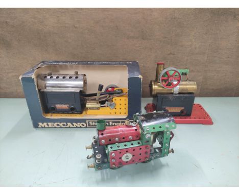 Lot to include a Meccano Locomotive, boxed Meccano Steam Engine and a stationary Steam Engine by Mamod. (3) 