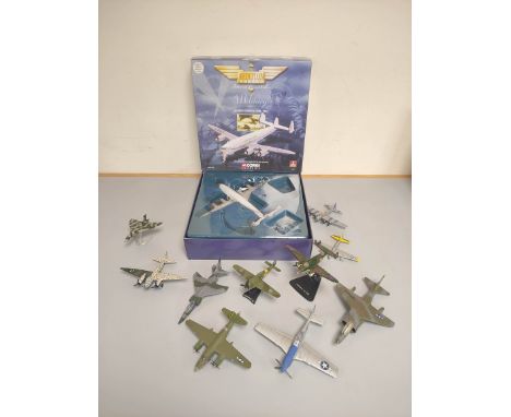 Eleven collector's model airplanes. To include a boxed Corgi Aviation Archive Lockheed Constellation USAF, Ertl U.S Harrier, 