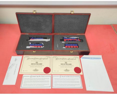 Two limited edition Bachmann Branch-Line Sir Guy Williams WD 2-8-0 model trains. Both complete with boxes and papers. Serial 