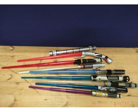 Star Wars- Quantity of toy light sabers to include Obi Wan, Mace Windu, Count Dooku and Darth Maul. (9) 