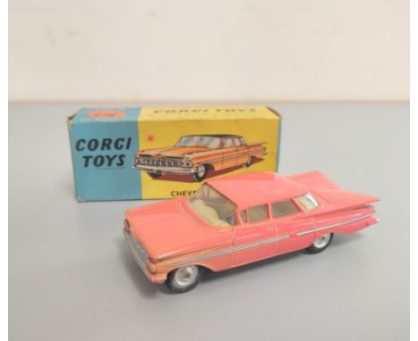 Corgi Toys- Chevrolet Impala, salmon pink model with lemon interior no 220 complete with box &amp; leaflet. 