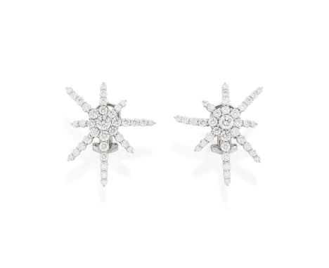 CHOPARD: DIAMOND EARRINGSEach star with eight asymmetrical rays, set throughout with brilliant-cut diamonds in 18 carat white