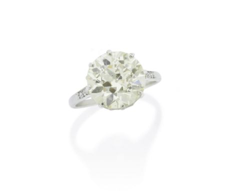 DIAMOND SINGLE-STONE RINGThe brilliant-cut diamond, weighing 5.02 carats, between single-cut diamond shoulders, ring size MFo
