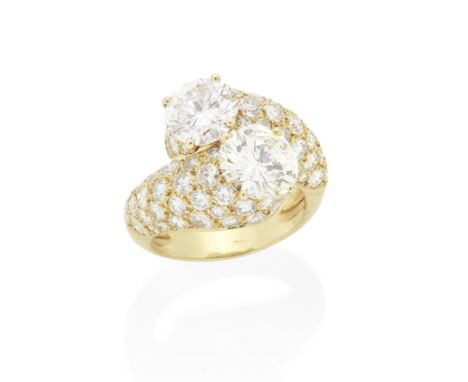MONTURE CARTIER: DIAMOND TOI-ET-MOI RINGThe brilliant-cut diamonds weighing 1.98 and 1.73 carats, issuing from bombé crossove