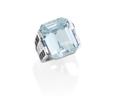 AQUAMARINE, DIAMOND AND SAPPHIRE RINGThe step-cut aquamarine, between shoulders set with calibré-cut sapphires and tapering r