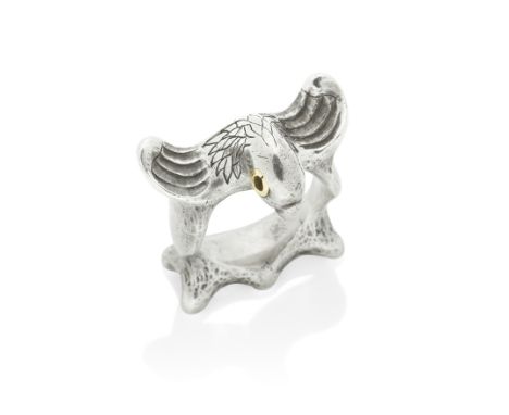 MOSHEH OVED: SILVER PARROT RING, CIRCA 1950Modelled standing, the displayed wings and neck engraved to resemble plumage, with