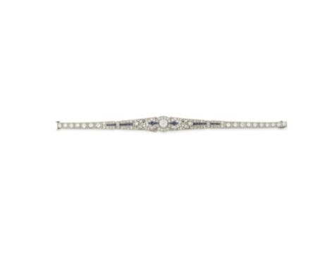 DIAMOND AND SAPPHIRE BRACELET, CIRCA 1920Centrally-set with a brilliant-cut diamond weighing approximately 0.75 carats, withi