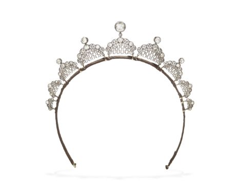 DIAMOND HALO ORNAMENT, 19TH-20TH CENTURYThe graduation of fan-shaped latticework panels set with cushion-shaped, old brillian