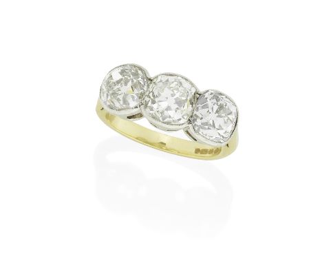 DIAMOND THREE-STONE RINGThe three old cushion-shaped diamonds weighing 1.47, 1.37 and 1.39 carats in collet settings, ring si