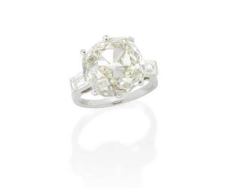 VAN CLEEF &amp; ARPELS: FANCY-COLOURED DIAMOND RINGThe old cushion-shaped diamond, weighing 8.43 carats, between baguette-cut