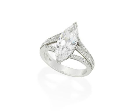 BOODLES: DIAMOND SINGLE-STONE RING, 2002The marquise-cut diamond, weighing 3.23 carats, between trifurcated shoulders set wit