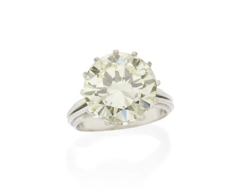 DIAMOND SINGLE-STONE RINGThe brilliant-cut diamond, weighing 7.93 carats, the gallery and shank with wirework detail, ring si