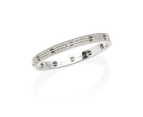 CARTIER: DIAMOND 'LOVE' BANGLEThe polished oval band pavé-set throughout with brilliant-cut diamonds, decorated with black ce