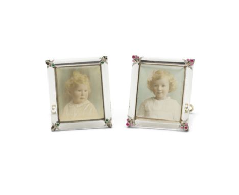 PAIR OF ROCK CRYSTAL AND GEM-SET PHOTO FRAMES, CIRCA 1920Each rock crystal frame containing a tinted photograph on card of an