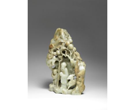 A LARGE PALE GREEN AND RUSSET JADE 'SHOULAO' BOULDER18th centuryBoldly carved in openwork with the bearded sage Shoulao in lo