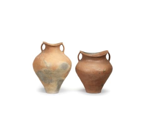 A BURNISHED POTTERY JARNeolithic Period, Siwa CultureWith an ovoid body rising from a small flat base, widening at the should
