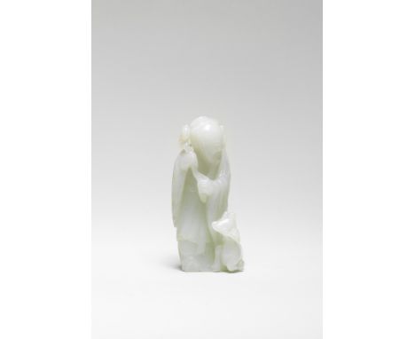 A WHITE JADE FIGURE OF SHOULAO AND DEER18th centuryCrisply carved as the elderly bearded sage in long flowing robes carrying 