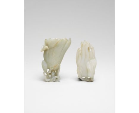 A WHITE JADE FINGER CITRON CARVING18th/19th centuryDeftly carved as a larger and smaller finger citron fruit borne on a gnarl