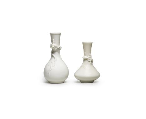 A BLANC-DE-CHINE 'CHILONG' VASEKangxiThe pear-shaped vase with a chilong clambering around the neck, grasping a leafy stem in