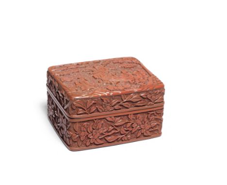 A CARVED CINNABAR LACQUER BOX AND COVERLate Ming DynastyThe rectangular box with straight sides and flat cover carved with th