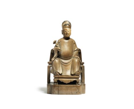 A RARE BOXWOOD SEATED FIGURE OF GU ZHENGUANLate 17th/18th centuryCarved from a solid block, the impassive figure seated on a 
