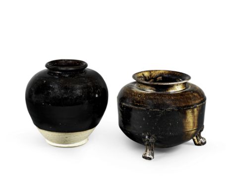 A BLACK-GLAZED RUSSET-SPLASHED TRIPOD INCENSE BURNER AND A BLACK-GLAZED JARTang DynastyThe jar of ovoid form, supported on a 
