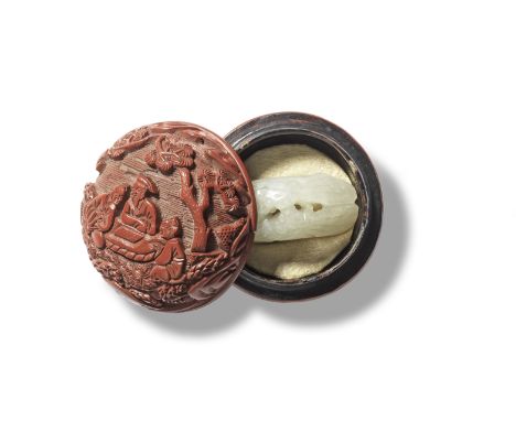 A SMALL CARVED CINNABAR LACQUER 'TREASURE' BOX AND COVER ENCLOSING A JADE CARVINGThe lacquer box 17th/18th century, the jade 