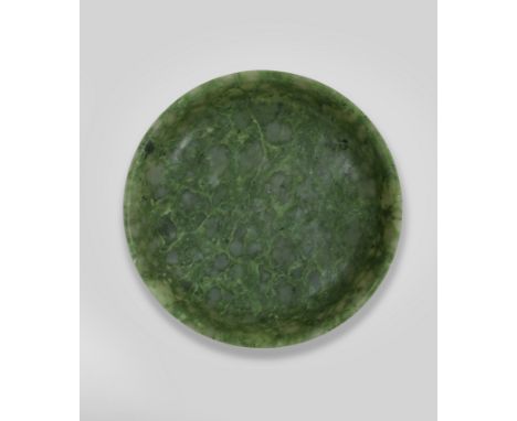 A FINE SPINACH-GREEN JADE DISHQianlongCarved with gently-rounded sides rising from a slightly-tapered short foot ring to a ge