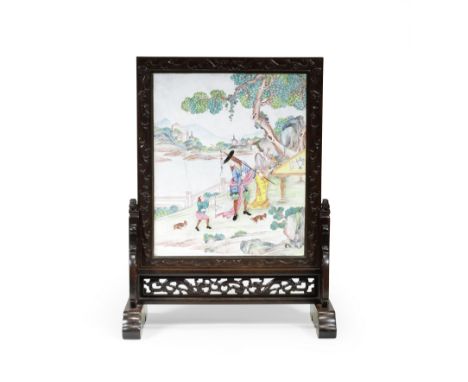 A RARE AND LARGE PAINTED ENAMEL 'EUROPEAN SUBJECT' DOUBLE-SIDED SCREENQianlong, the zitan stand and frame, 19th centuryExquis