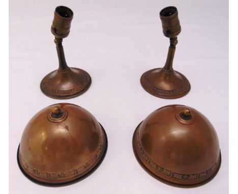 A pair of vintage copper British Rail lamp stands with shades
