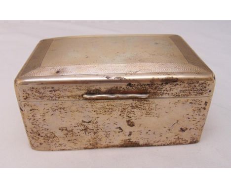 A hallmarked silver rectangular engine turned, cedar wood lined cigarette box